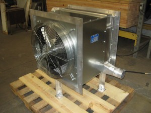 Heat exchangers and aftercoolers for blower systems